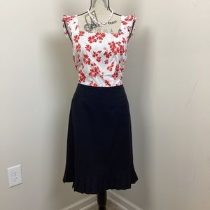 .Women’s Black Skirt with Pleated Hem